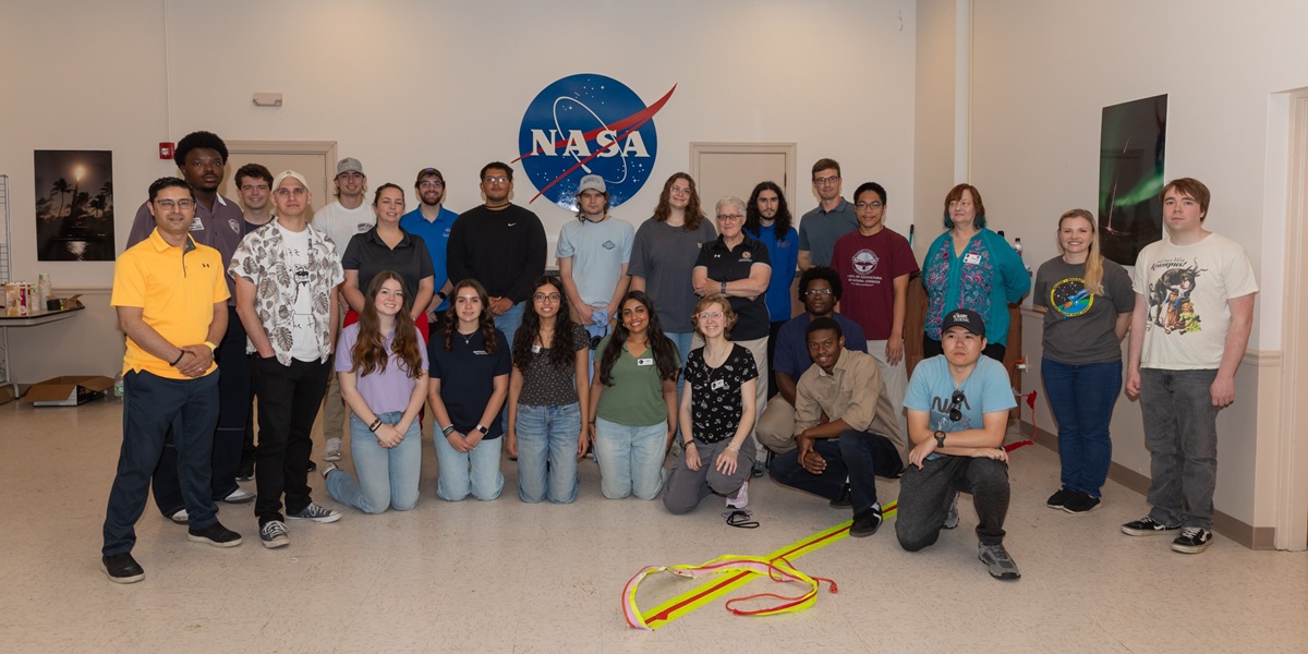 A group of students and faculty at the RockOn program.