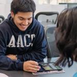 Students at computers in Truxal Library.