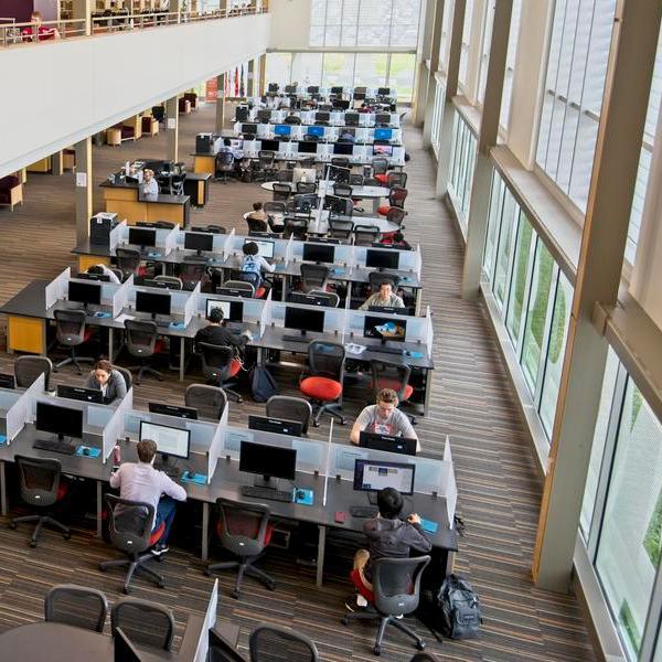 Students at computers in Truxal Library.