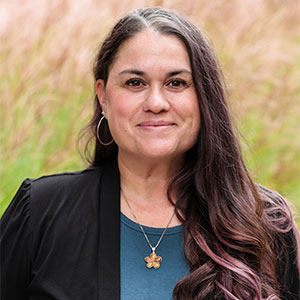 Headshot of board member, M. Alexandra Matiella Novak