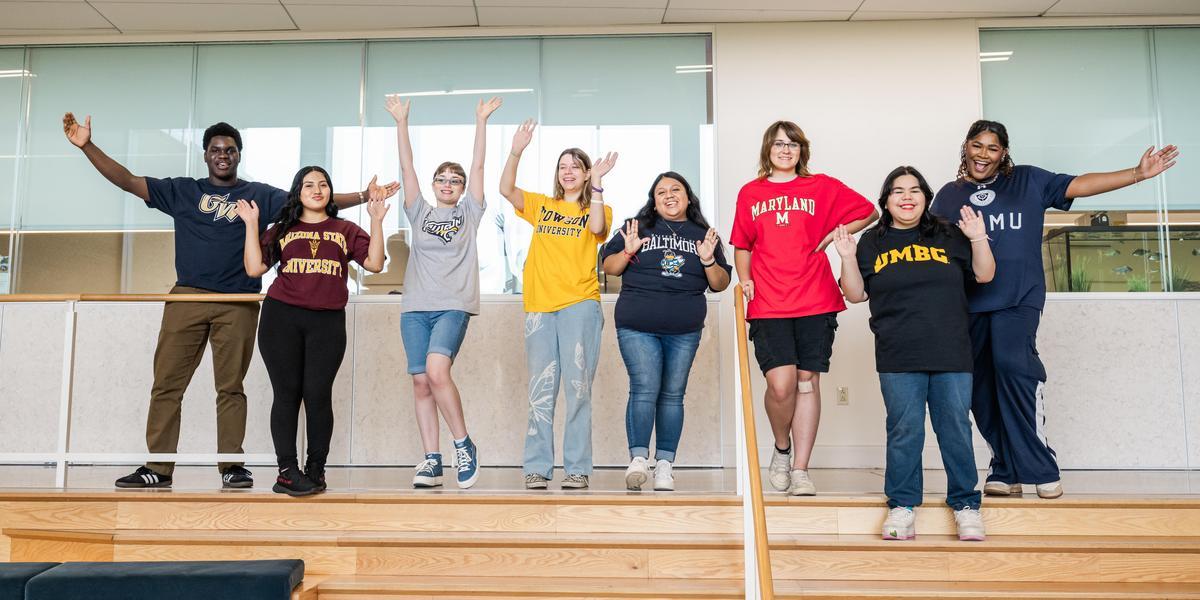 Students wearing t-shirts from colleges they plan to transfer to.
